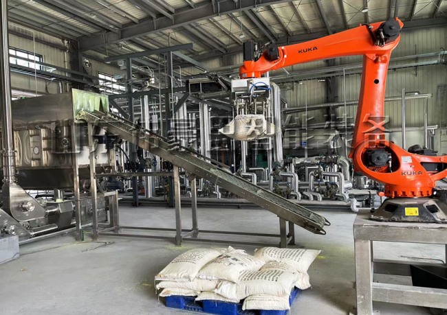 PE顆粒機器人拆包機，機械手全自動破袋設(shè)備