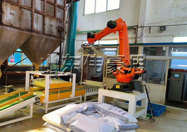 六氯苯胺自動(dòng)碼垛機(jī)器人，袋料機(jī)械手碼垛設(shè)備