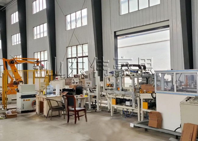 錳塊自動裝箱碼垛生產(chǎn)線，紙箱全自動碼垛機械手