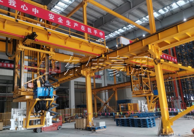 化工粉料噸袋自動裝車機，噸包全自動裝車設(shè)備現(xiàn)場